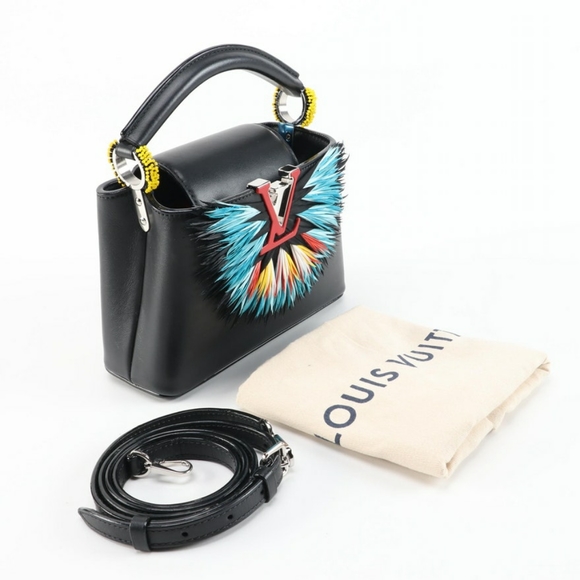 🚫SOLD🚫Louis Vuitton Rare Feather Capucines - Picture 2 of 9